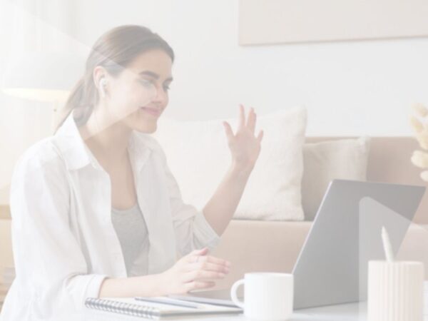 woman on a computer looking at tips to create effective video marketing