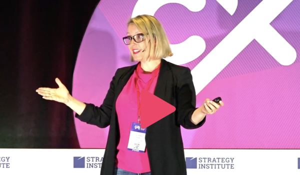 Screenshot of Berndaette Butler on stage at CX Strategies Summit giving a presentation